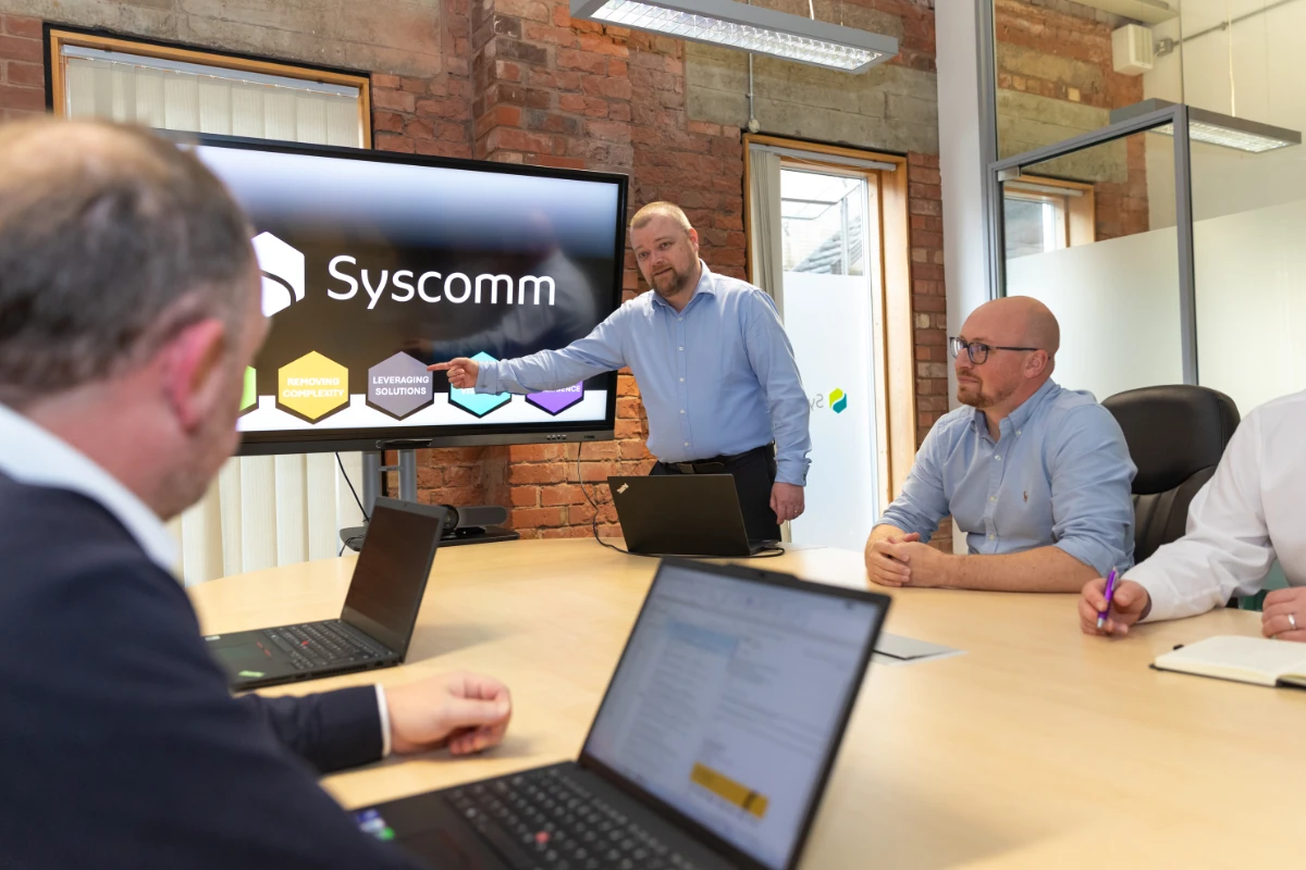 Syscom team in a meeting